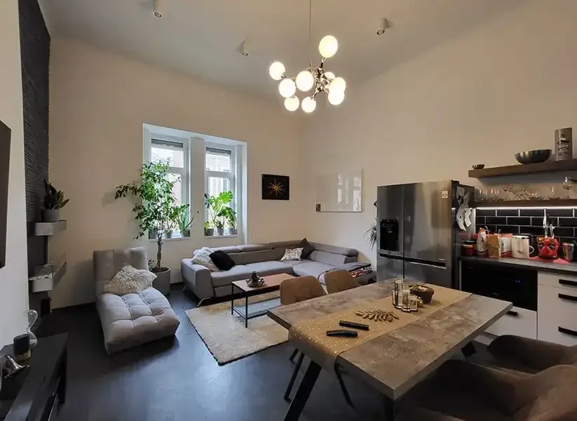 Living room of an apartment we manage, with open kitchen and dining area